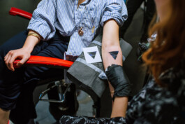 Triangle tattoo on forearm