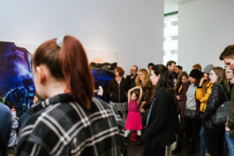 Crowd at live tattoo demo in Denver