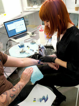 Amanda Wachob tattooing at New Museum 