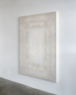 White lace painting on a wall 