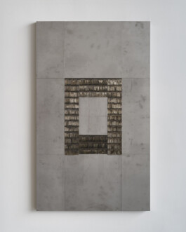 Steel sculpture on a wall 