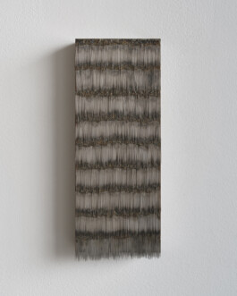 Front view of tattoo needle sculpture 