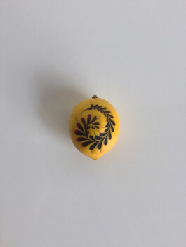 Tattooed lemon with black lace